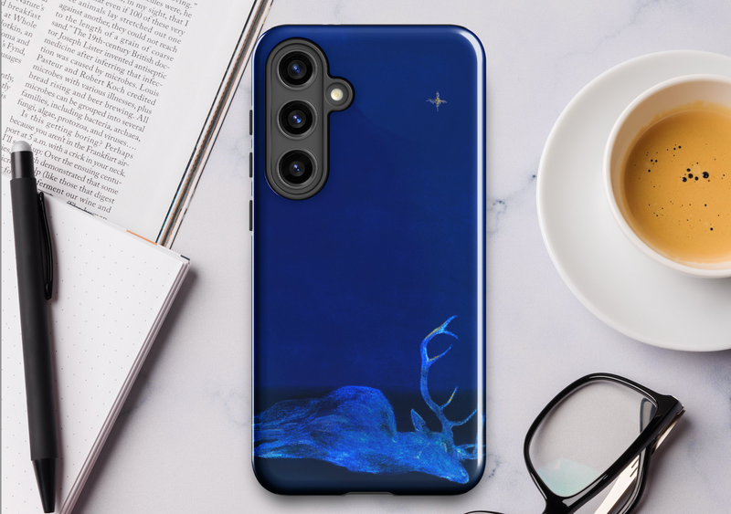 artwork phone case on a desk surrounded by coffee and notebook