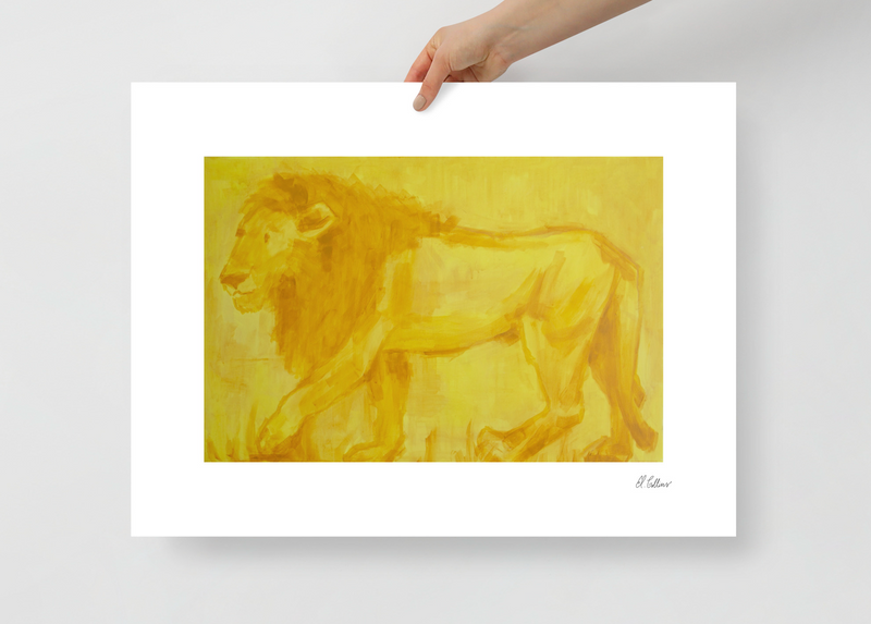 lion art print being held by hand